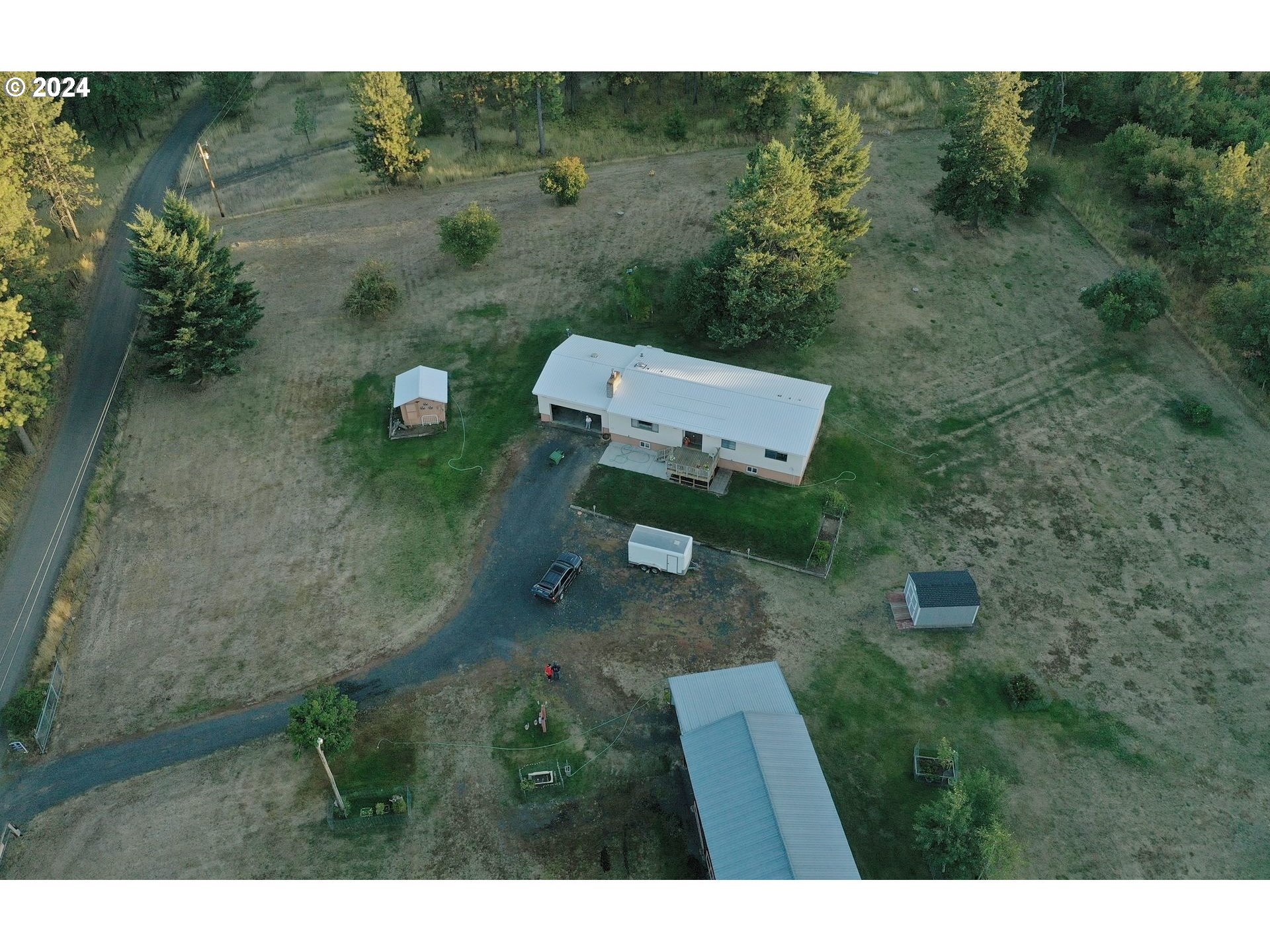 49414 County 1028 Road Pendleton, OR 97801 - Photo 4 of 48 a view of a house with a outdoor space