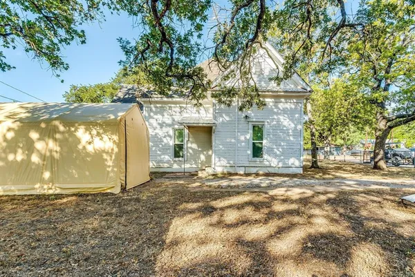 a swimming pool with wooden fence