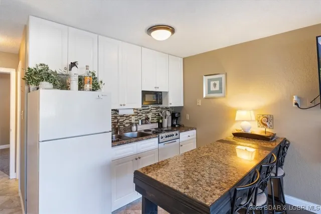 $165,000 | 5655 Heron Bay Drive, Unit F107, Osage Beach, MO 65065