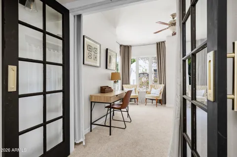 a living room with furniture and a window