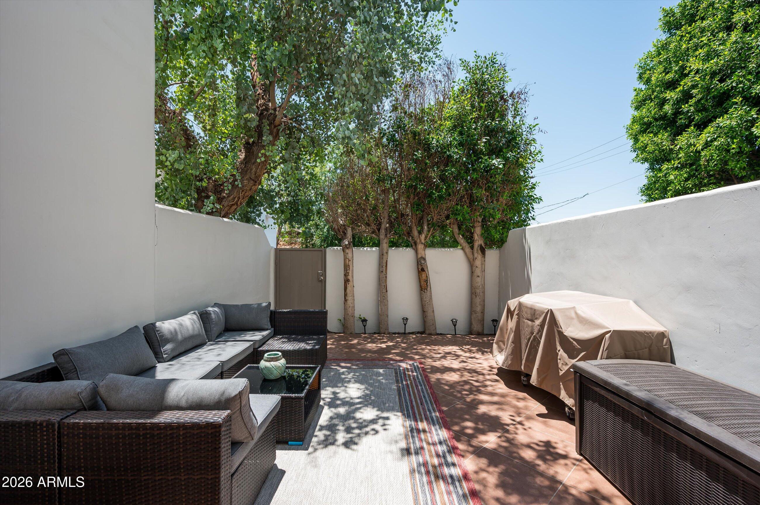 4955 East Indian School Road, Unit 9 Phoenix, AZ 85018 - Photo 9 of 25 a view of outdoor space with seating