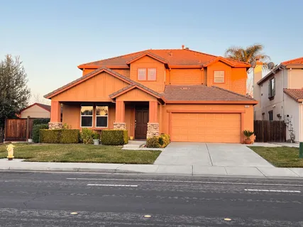 front view of a house and a yard