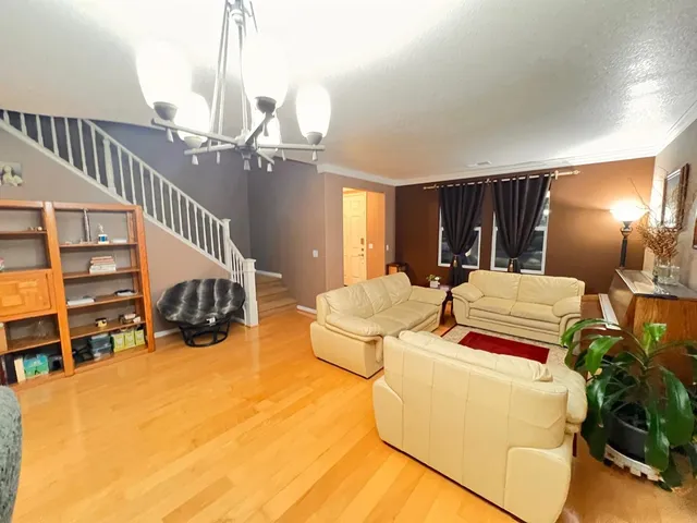 a view of a livingroom with furniture and a living room