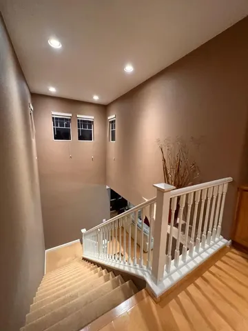 a view of a house with porch and wooden floor