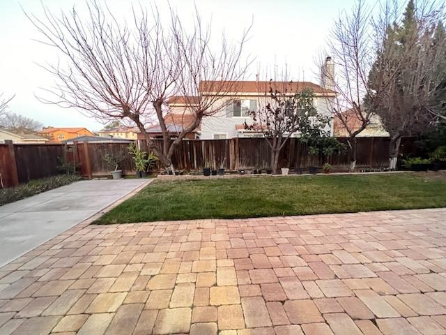 484 Presidio Place Tracy, CA 95377 - Photo 31 of 40 a view of a yard with a house and in the background
