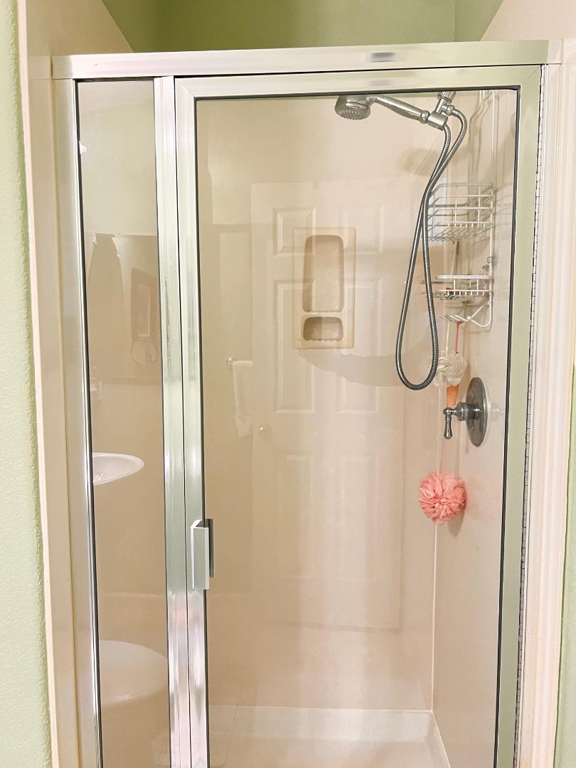 484 Presidio Place Tracy, CA 95377 - Photo 34 of 40 a bathroom with a shower