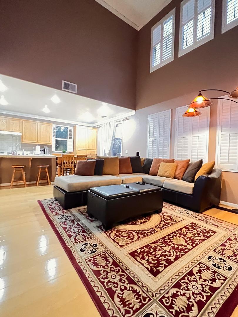 484 Presidio Place Tracy, CA 95377 - Photo 35 of 40 a living room with furniture and a rug
