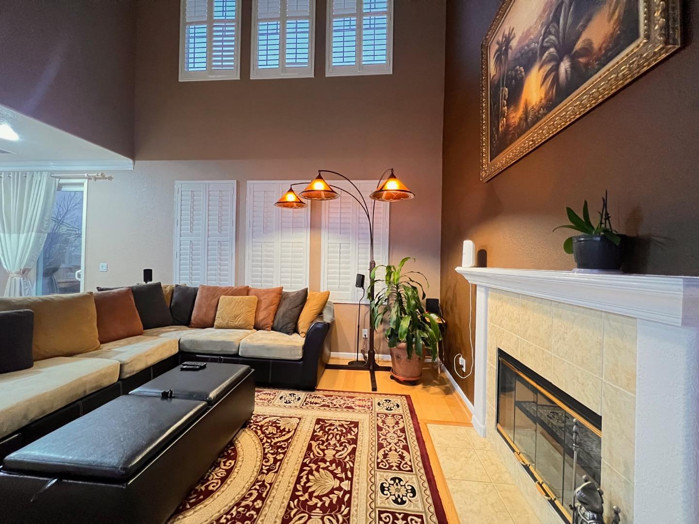 484 Presidio Place Tracy, CA 95377 - Photo 36 of 40 a living room with furniture and a fireplace