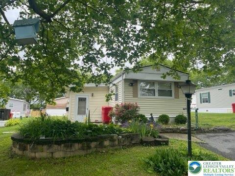 10 Springridge Road Bath, PA 18014 - Photo 3 of 20 a front view of house with yard and green space