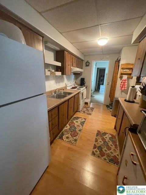 10 Springridge Road Bath, PA 18014 - Photo 7 of 20 a kitchen with stainless steel appliances granite countertop a refrigerator a stove and a sink