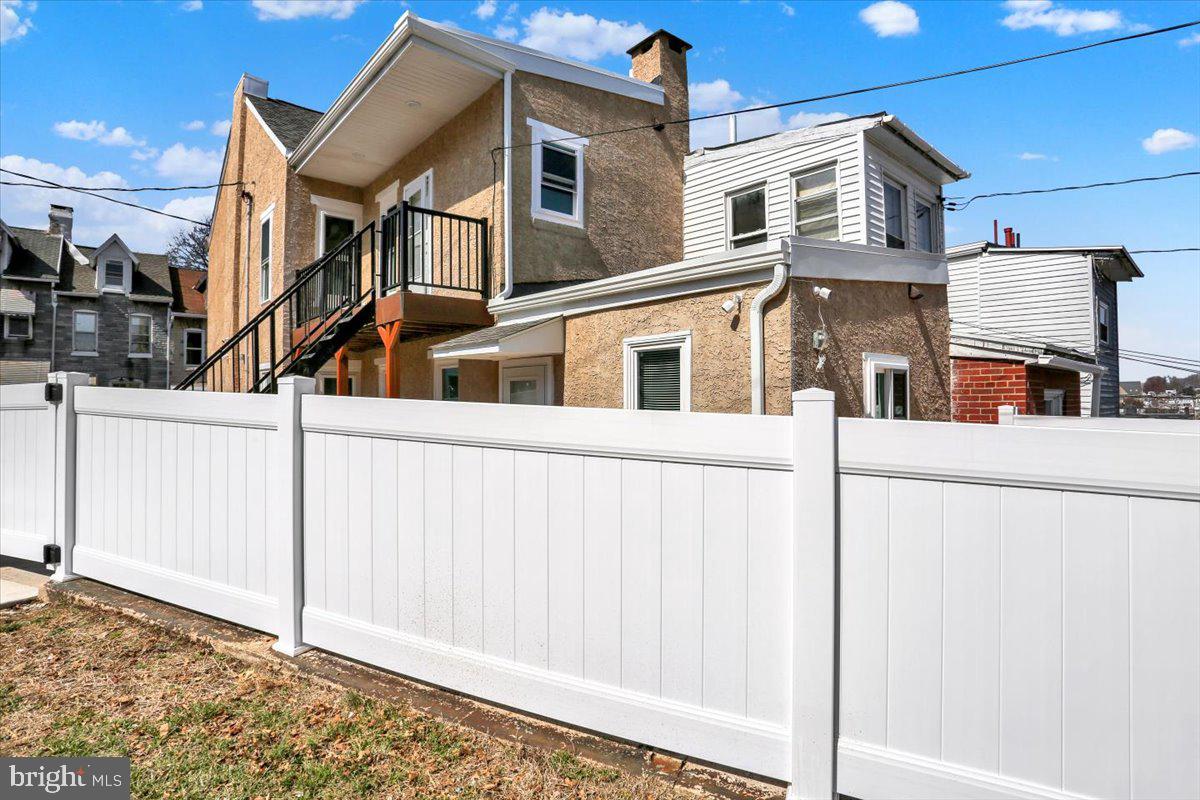 553 Wunder Street, Unit 2 Reading, PA 19602 - Photo 20 of 20 a view of a house with many windows