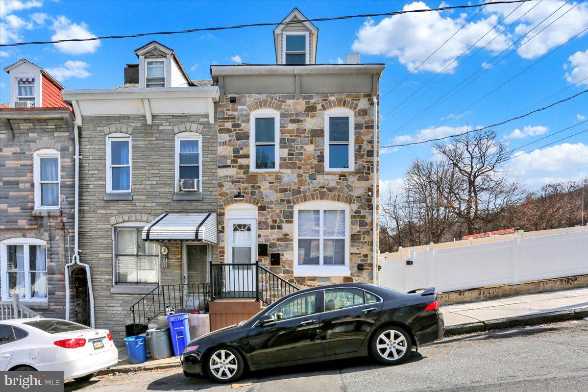 553 Wunder Street, Unit 2 Reading, PA 19602 - Photo 2 of 20 a car parked in front of a building