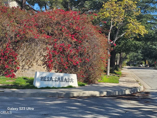 a sign that is on the side of a road