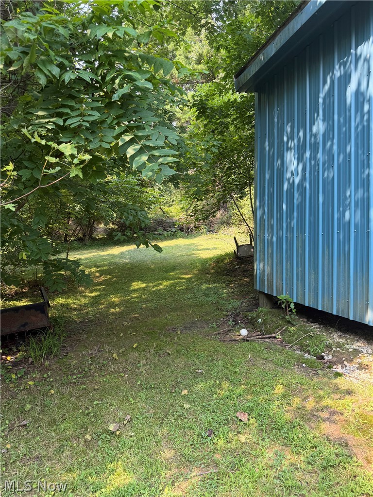 1600 Core Road Parkersburg, WV 26104 - Photo 7 of 24 small yard area behind outbuilding