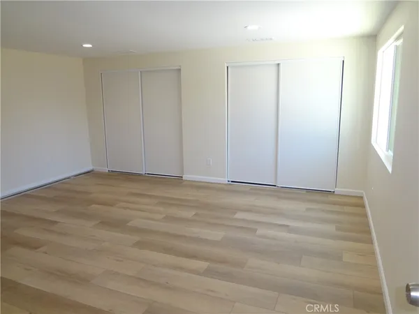 a view of an empty walk in closet