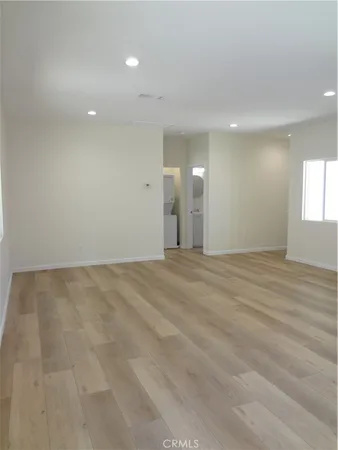 an empty room with a natural light