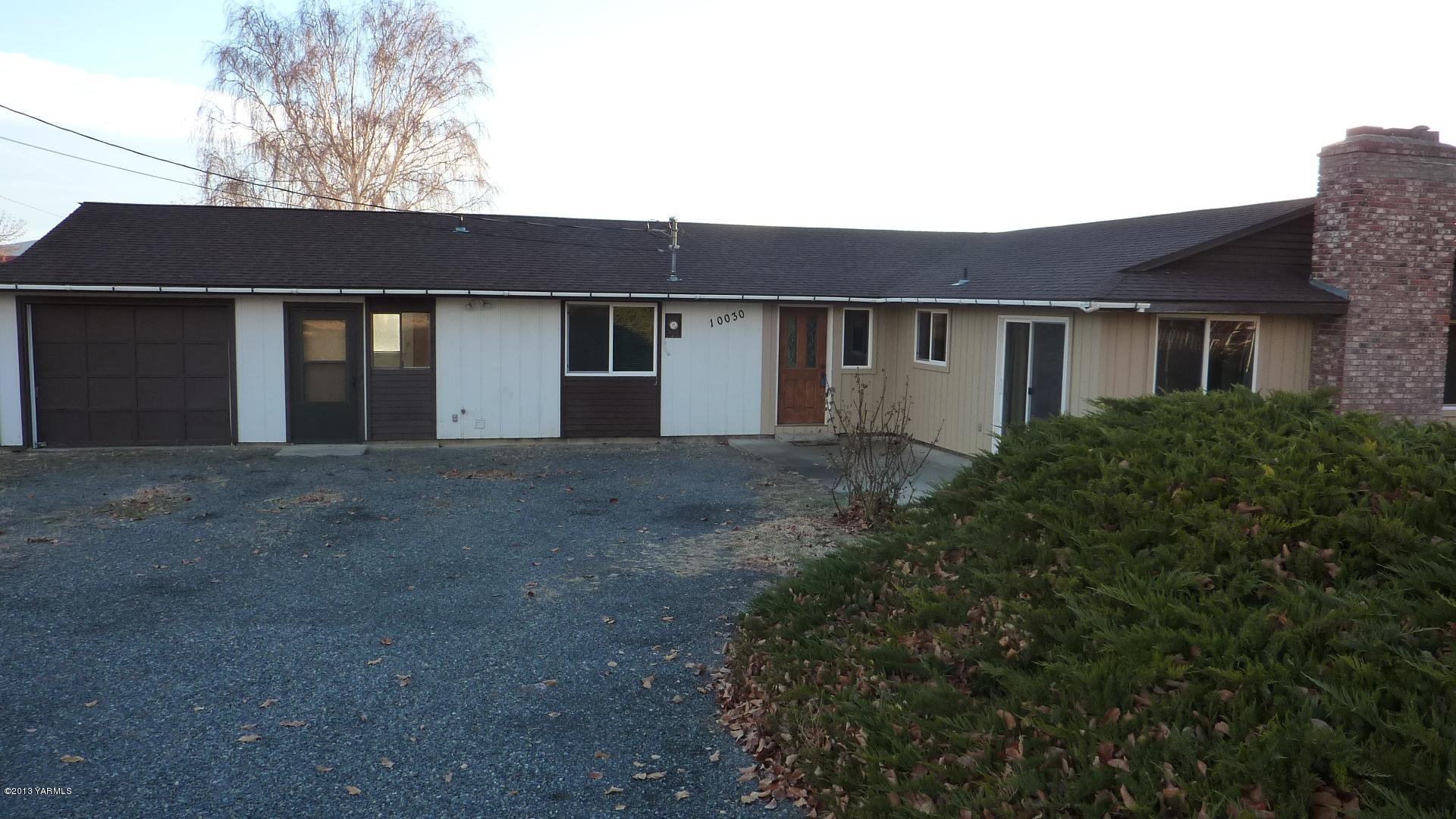 10030 Mieras Road Yakima, WA 98901 - Photo 1 of 23 a house view with a outdoor space