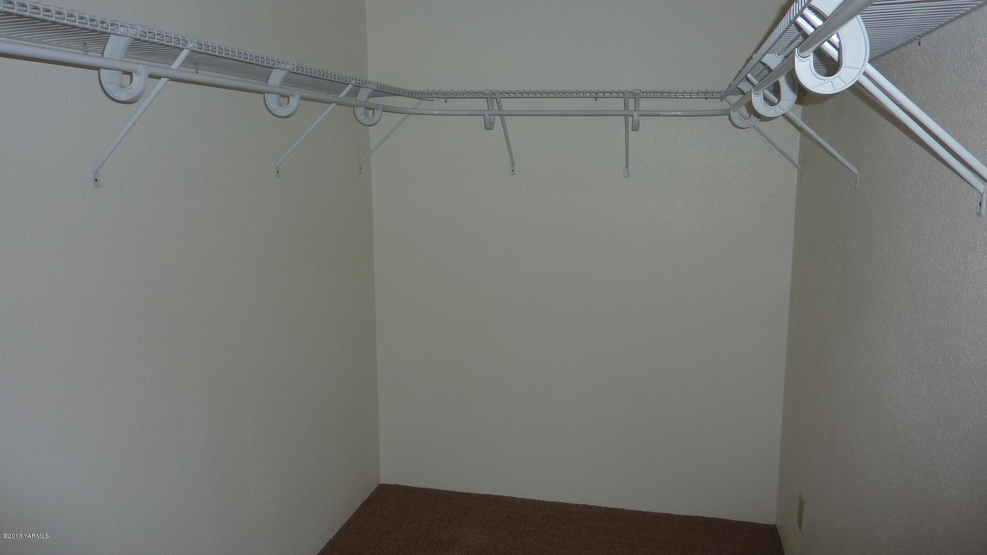 10030 Mieras Road Yakima, WA 98901 - Photo 16 of 23 a view of a room with racks on the wall