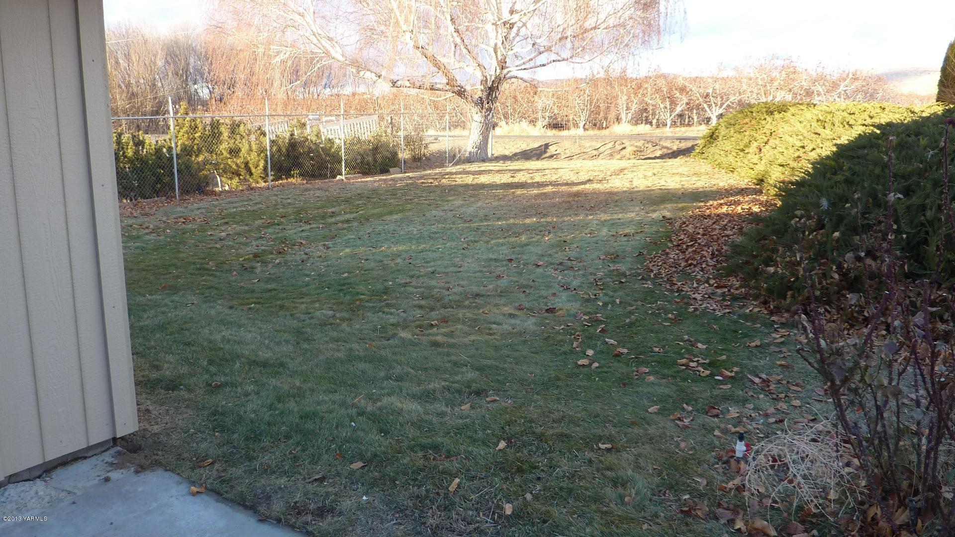 10030 Mieras Road Yakima, WA 98901 - Photo 19 of 23 a view of yard with green space