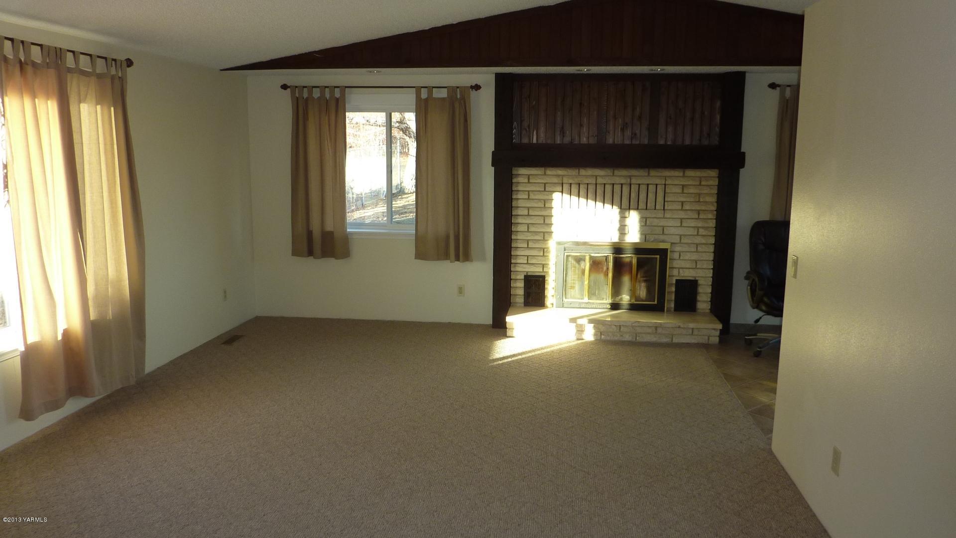 10030 Mieras Road Yakima, WA 98901 - Photo 5 of 23 a view of a room with a large window