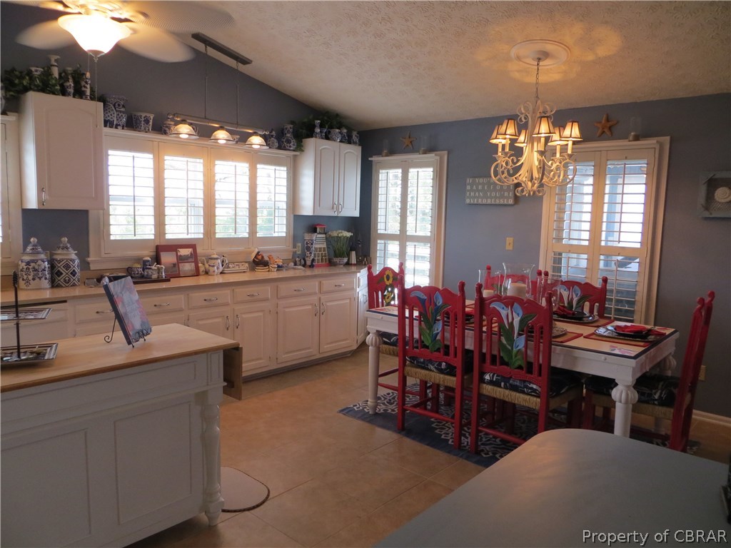 2818 Haven Beach Road Diggs, VA 23045 - Photo 2 of 17 Large open kitchen, dining. An abundants of cabinets and counter space for ease of entertaining