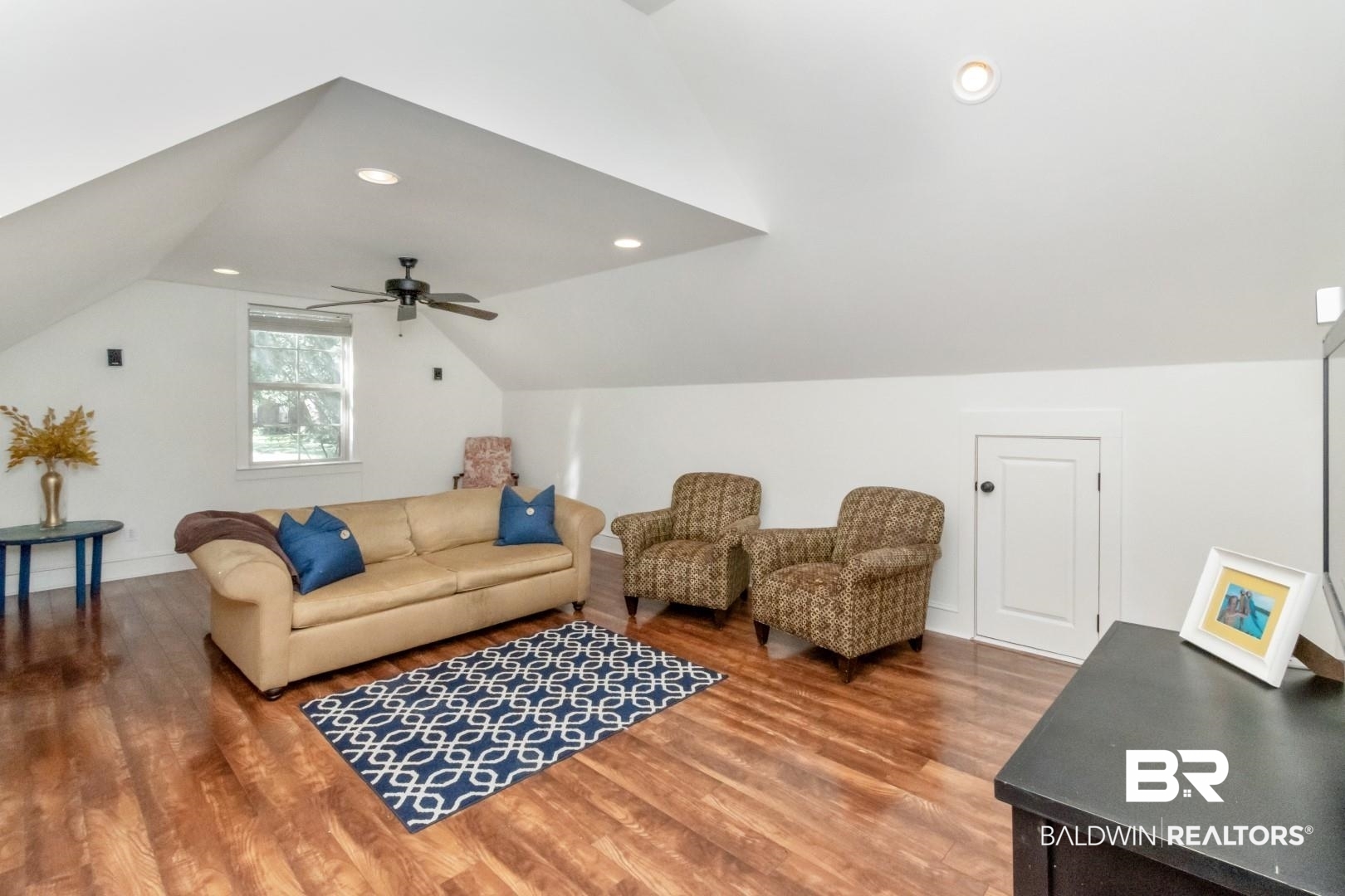 8868 Dawes Lake Road South Mobile, AL 36619 - Photo 30 of 35 Living room with lofted ceiling, hardwood / wood-style flooring, and ceiling fan