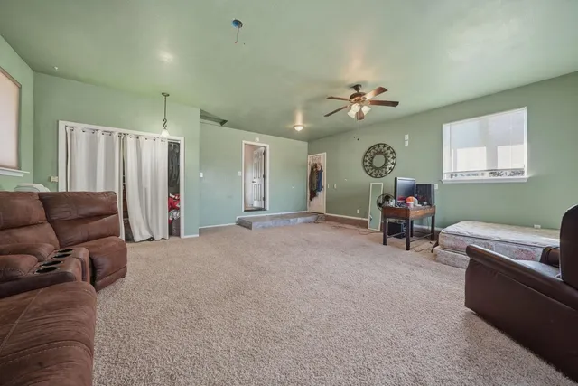 a view of a balcony with wooden floor