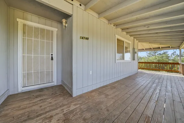 a house with trees in front of it