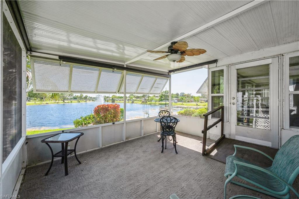 32 Monaco Terrace Naples, FL 34112 - Photo 16 of 19 a living room with furniture and a large window