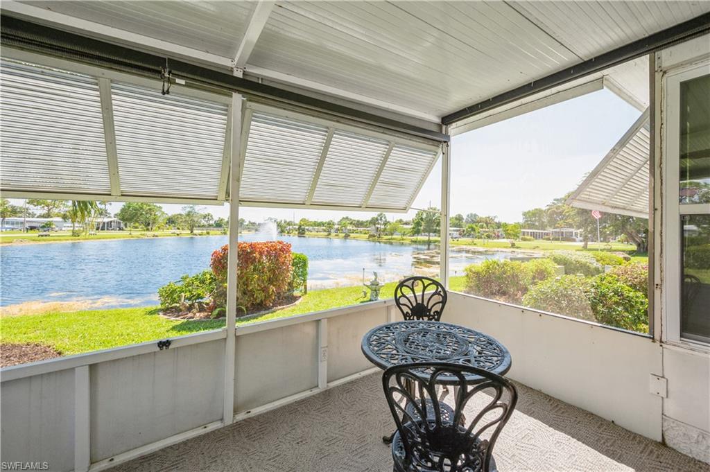32 Monaco Terrace Naples, FL 34112 - Photo 17 of 19 a view of a swimming pool and outdoor seating