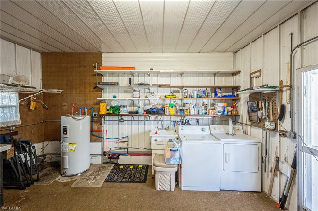 32 Monaco Terrace Naples, FL 34112 - Photo 19 of 19 a room with storage and utility