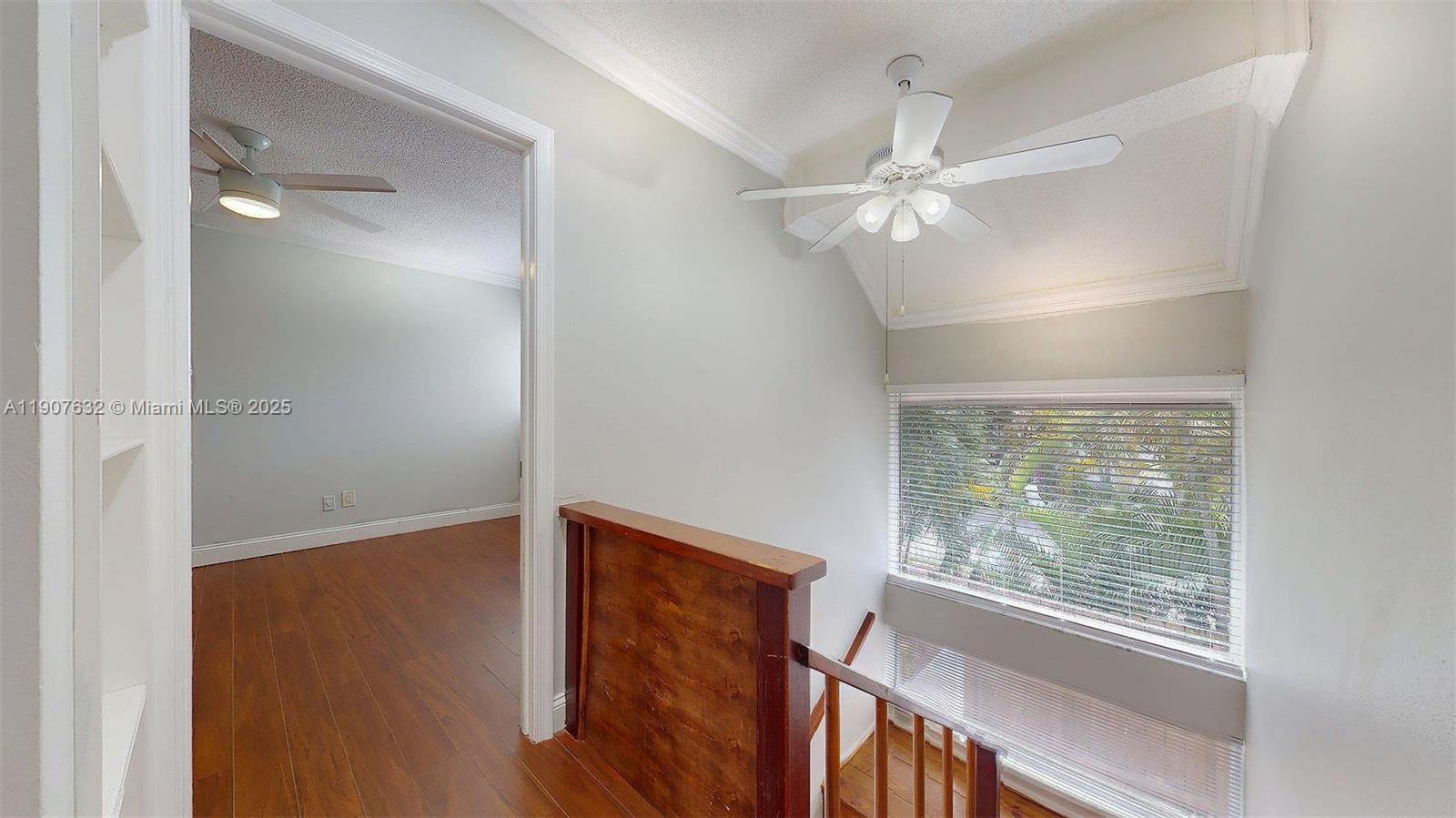 11339 Southwest 71st Street, Unit 11339 Miami, FL 33173 - Photo 11 of 28 an empty room with windows and closet