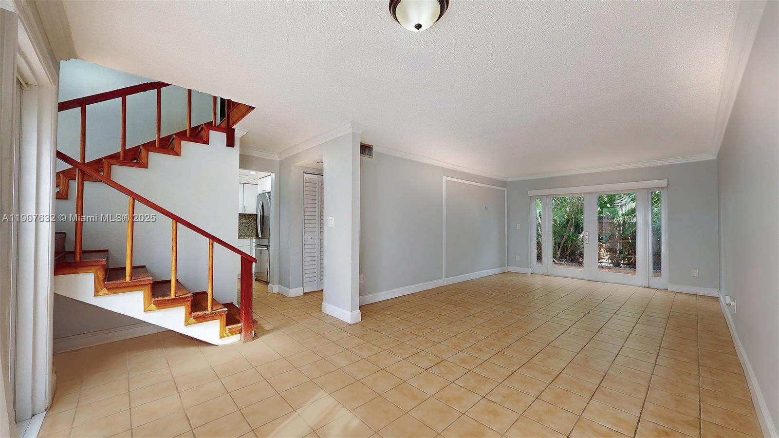 11339 Southwest 71st Street, Unit 11339 Miami, FL 33173 - Photo 15 of 28 a view of entryway and hall with wooden floor