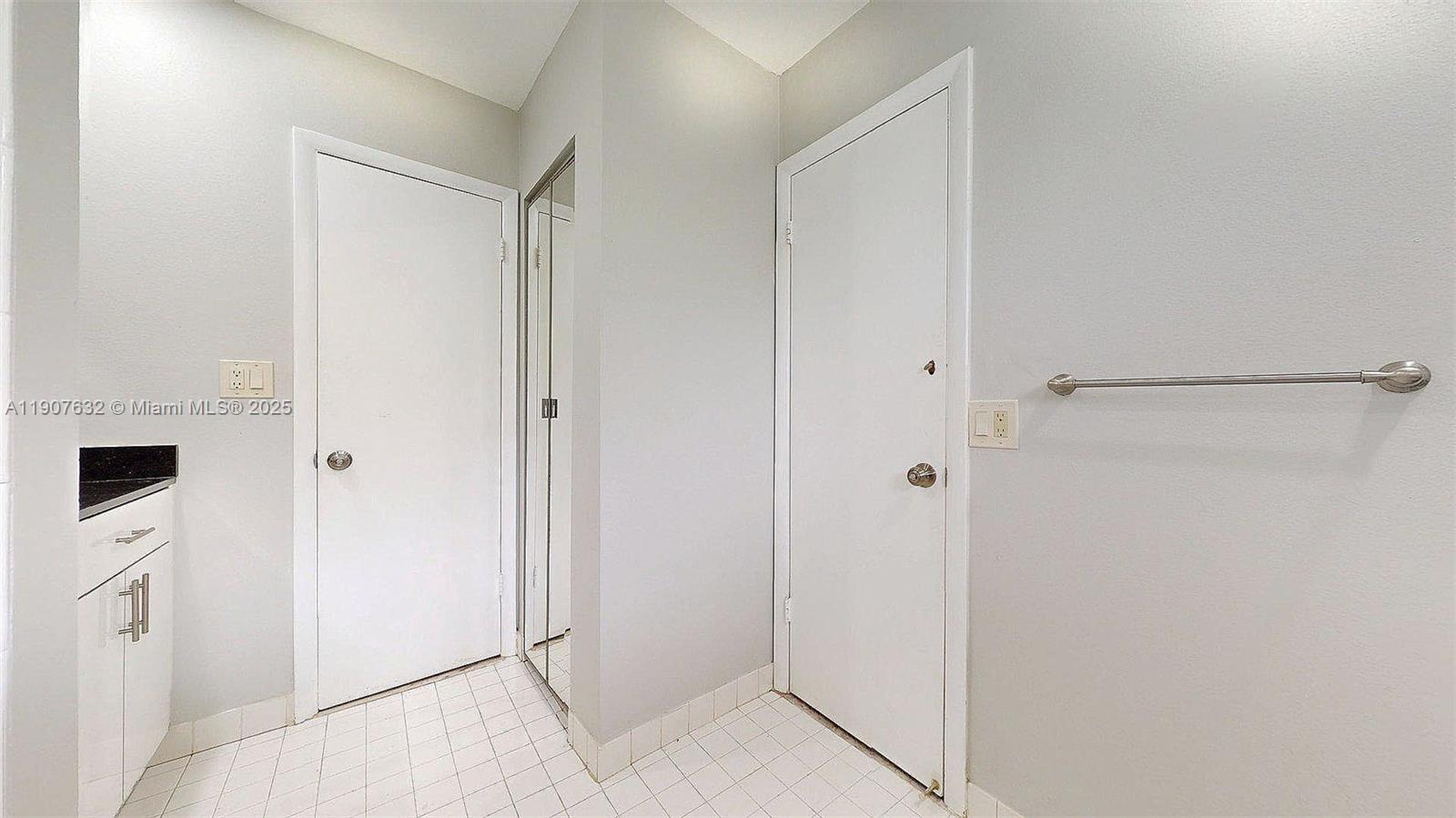 11339 Southwest 71st Street, Unit 11339 Miami, FL 33173 - Photo 10 of 28 a view of an empty room