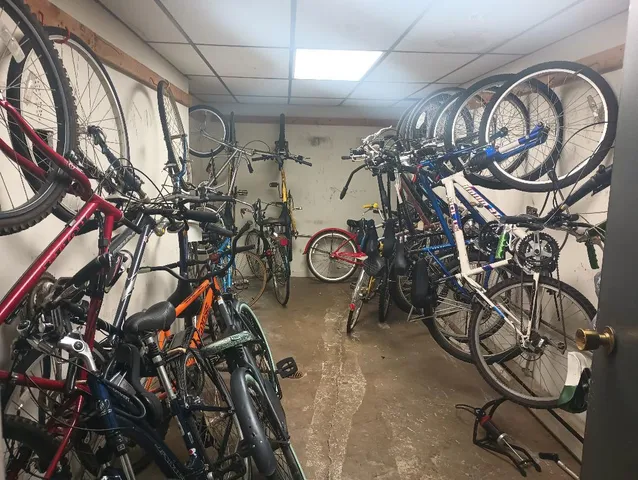 a view of a hallway with seating area