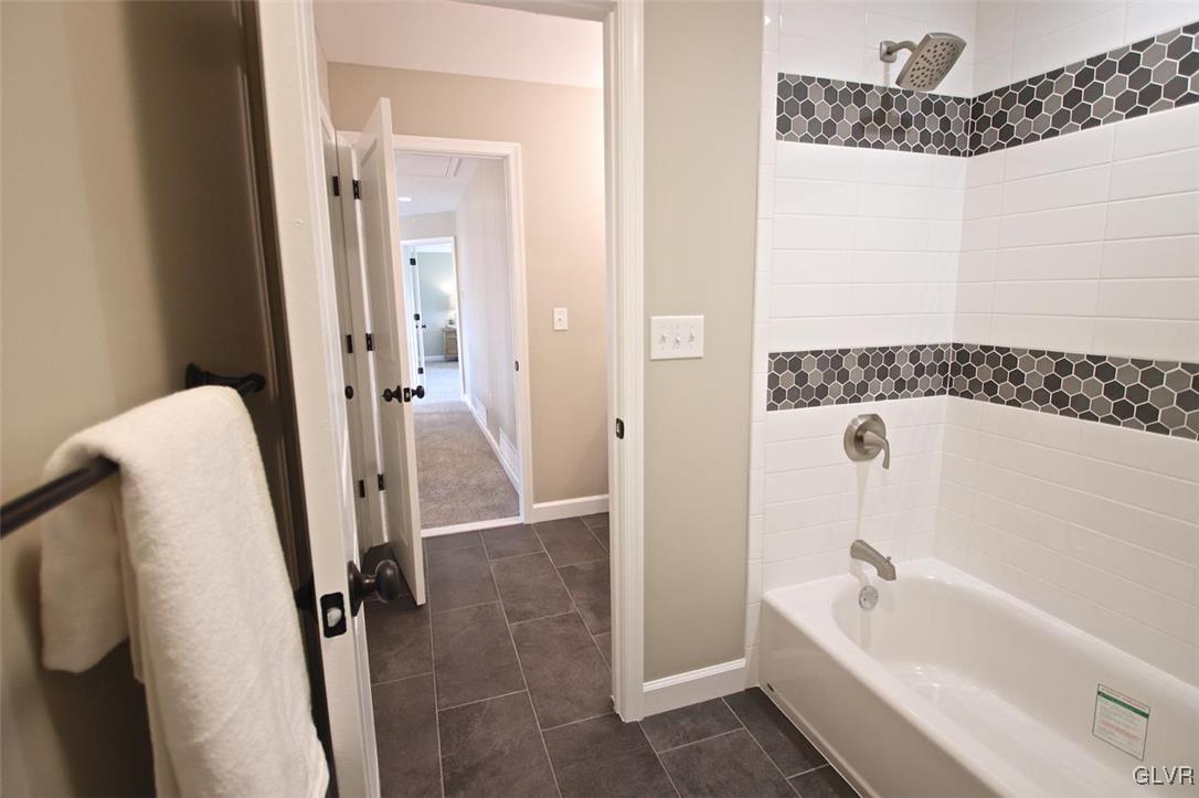 650 Clearfield Road Nazareth, PA 18064 - Photo 38 of 50 a bathroom with a tub a sink and a shower