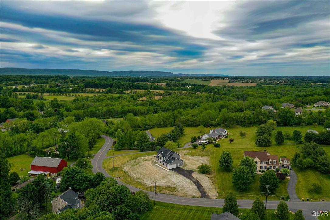 650 Clearfield Road Nazareth, PA 18064 - Photo 5 of 50 an aerial view of residential houses with outdoor space and trees