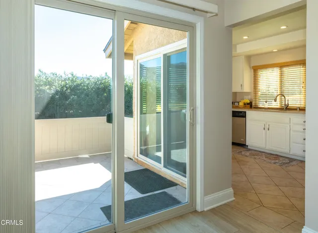 a bathroom with a tub shower and sink
