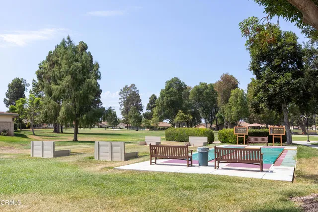 a garden view with a seating space