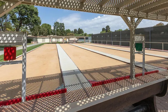 a view of swimming pool with outdoor seating