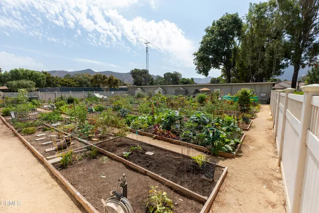 a view of a lake with a sitting area