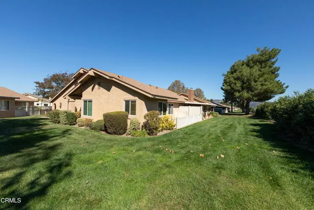 a view of a house with a big yard