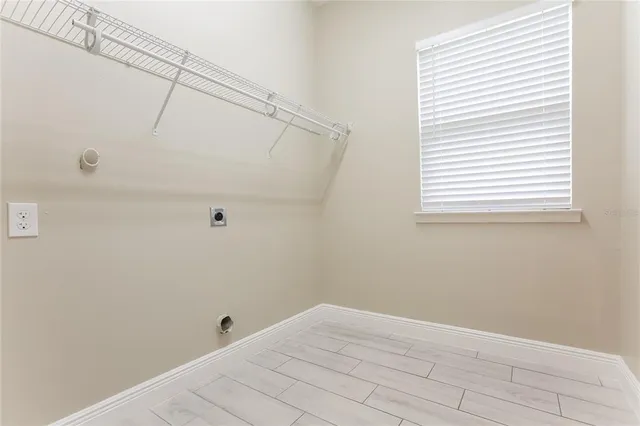 a view of small space with empty racks on the wall