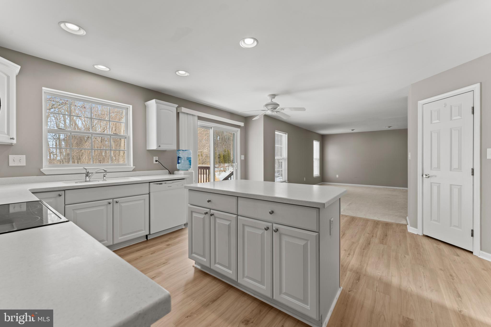 7756 Seneca Ridge Drive York, PA 17403 - Photo 22 of 50 a large kitchen with cabinets and wooden floor