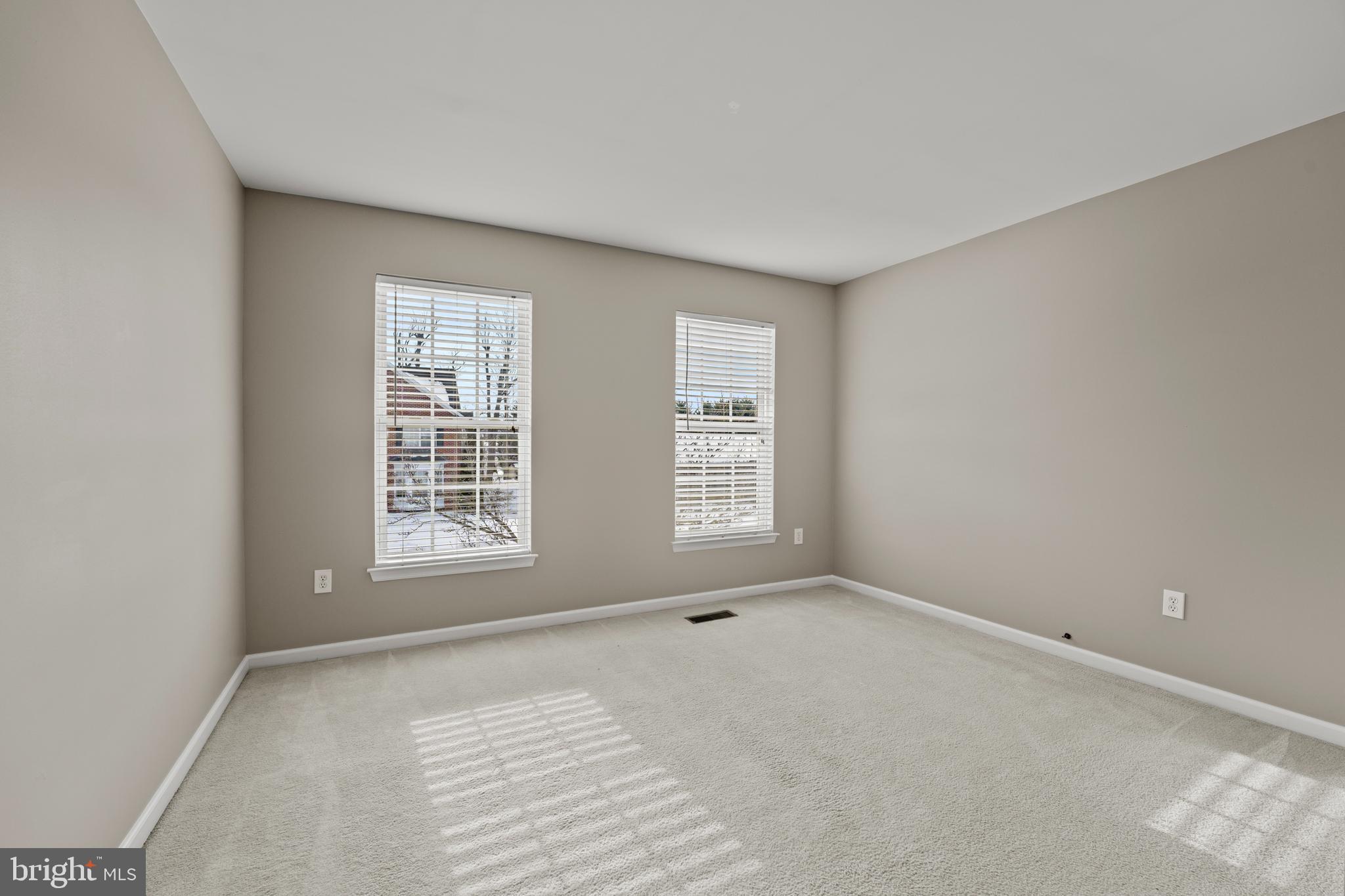 7756 Seneca Ridge Drive York, PA 17403 - Photo 29 of 50 an empty room with windows