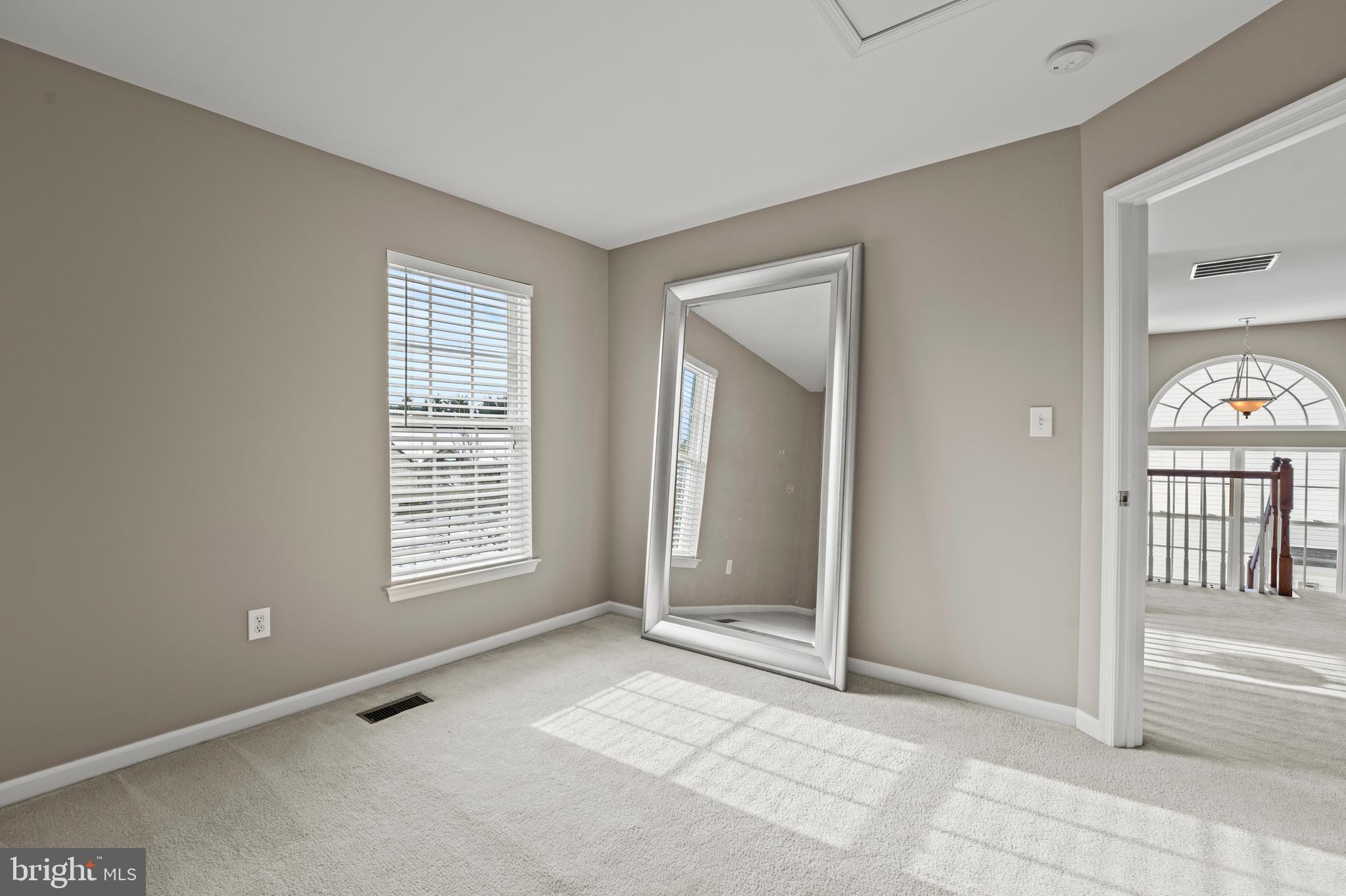 7756 Seneca Ridge Drive York, PA 17403 - Photo 30 of 50 an empty room with windows