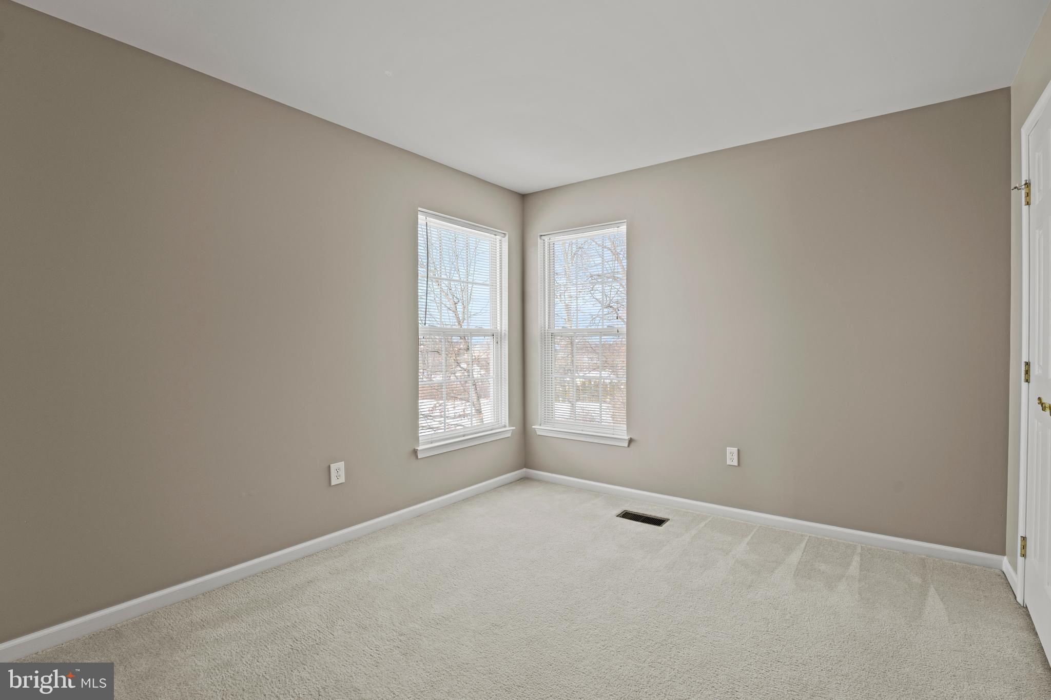 7756 Seneca Ridge Drive York, PA 17403 - Photo 31 of 50 an empty room with windows