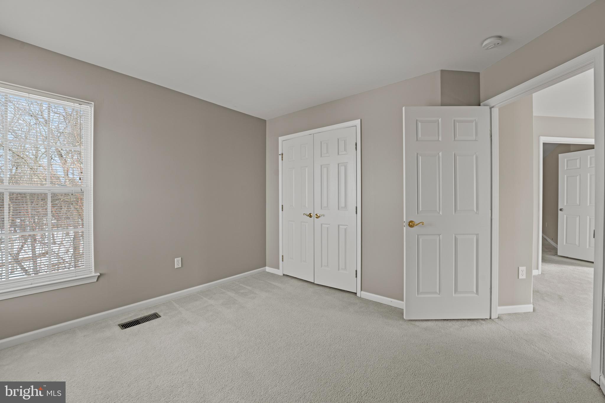 7756 Seneca Ridge Drive York, PA 17403 - Photo 32 of 50 a view of an empty room with windows and closet