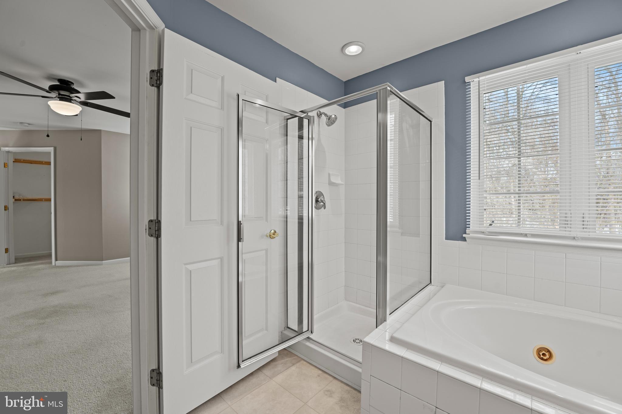 7756 Seneca Ridge Drive York, PA 17403 - Photo 40 of 50 a bathroom with a tub shower and a sink