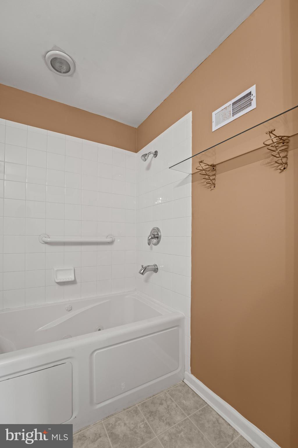 7756 Seneca Ridge Drive York, PA 17403 - Photo 47 of 50 a bathroom with a bathtub and a shower